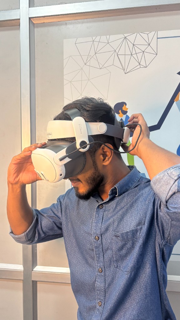 Student adjusting VR headset straps for an immersive drone simulation session